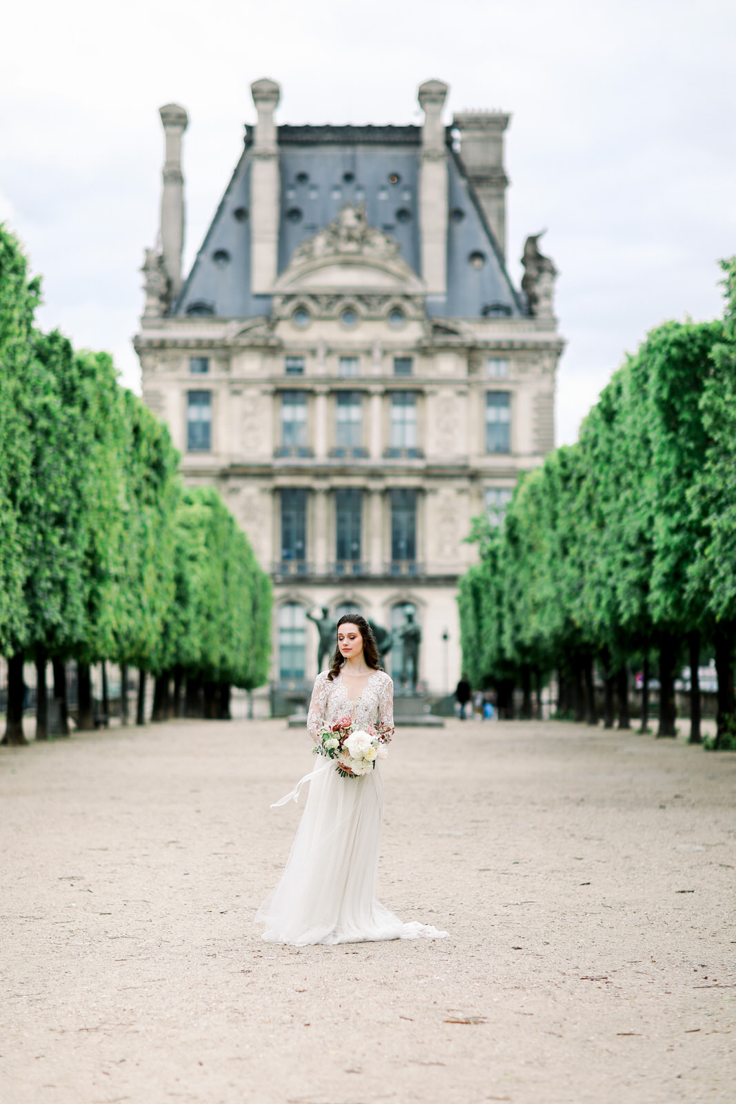 A destination wedding photographer based in North Carolina photographs a classic French bride at a Paris wedding.