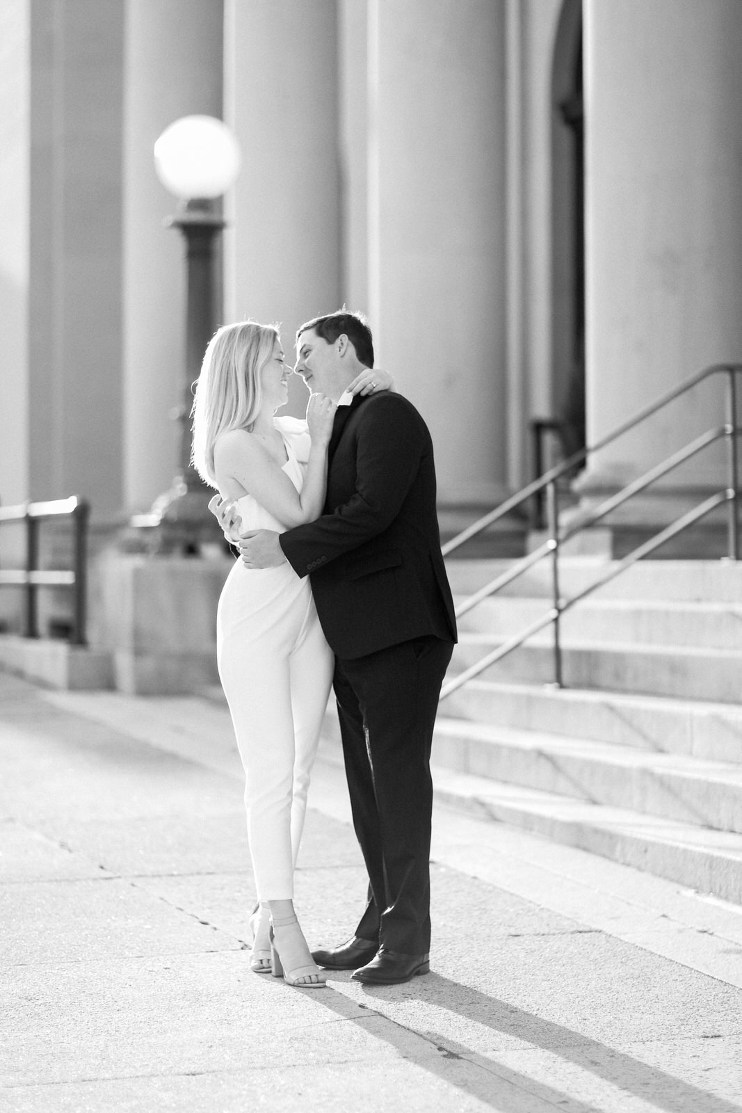 DC Wedding photographer photographs a stylish and classic couple during their downtown engagement photography session before their modern wedding.