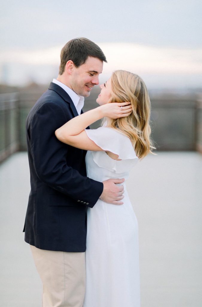 A modern bride and groom pose for their classic engagement photography session in Winston-Salem North Carolina.