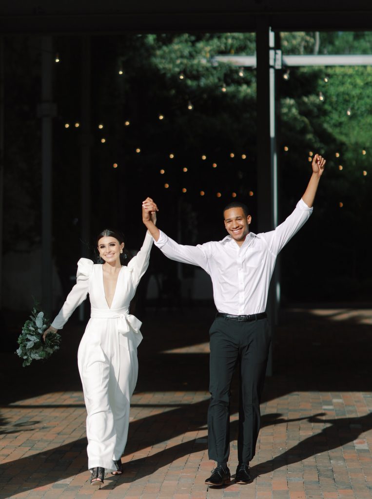 A Wilmington film wedding photographer captures a bi-racial couple at The Atrium on their wedding day.