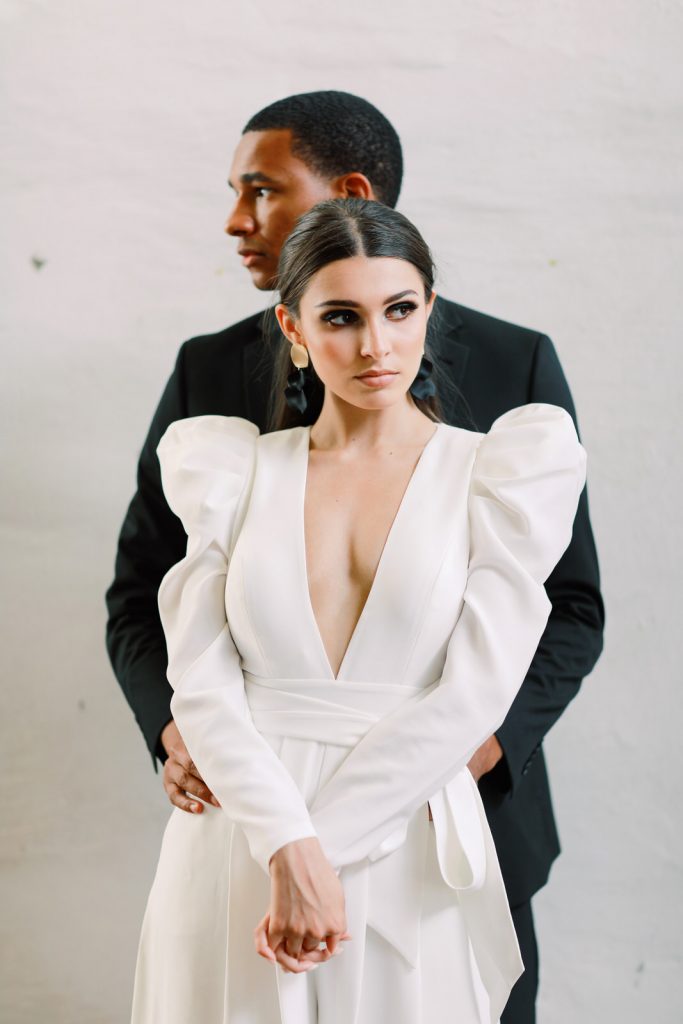 A Wilmington film wedding photographer captures a bi-racial couple at The Atrium on their wedding day.