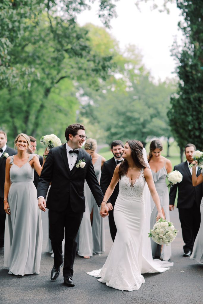 A Virginia film wedding photographer captures the bridal party portraits at a Smith Mountain Lake wedding.