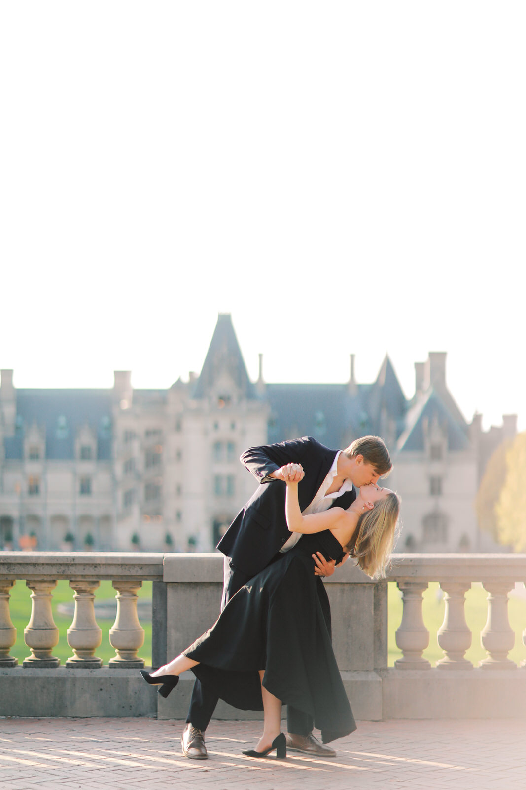 East Coast film wedding photographer captures a couple during their elegant engagement photography session at The Biltmore Estate.