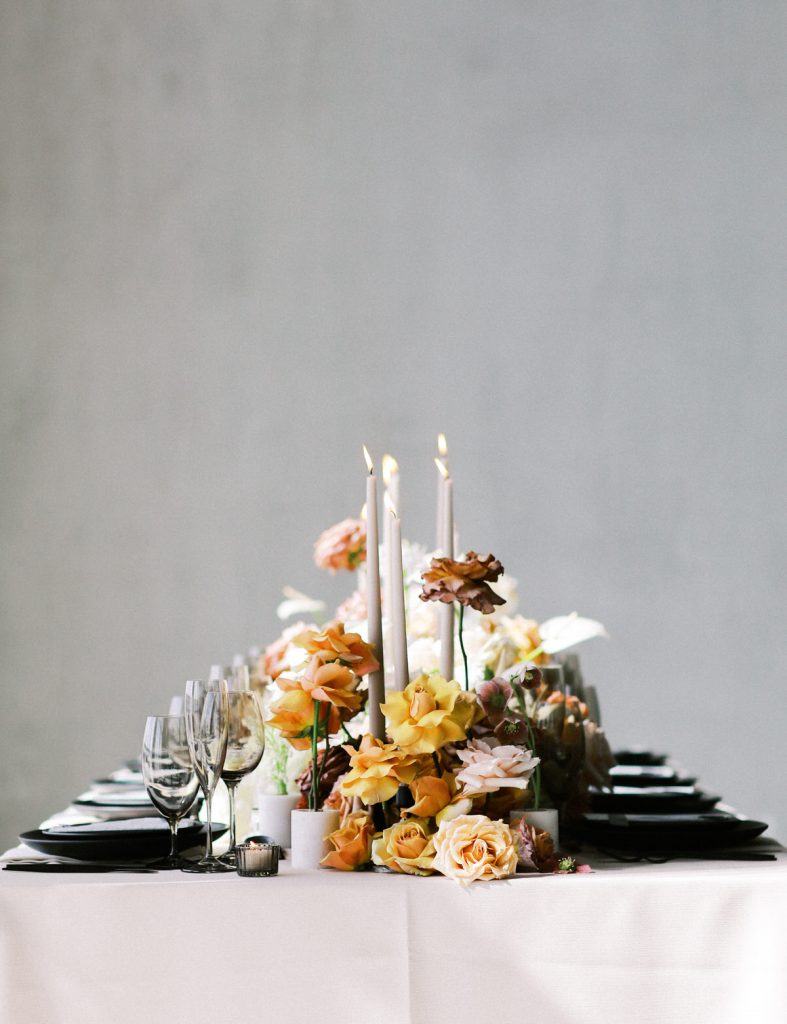 Romantic and modern DC wedding tablescape with creative florals by Sweet Root Village at the chic DC wedding venue La Vie Restaurant. Styled by East Made and photographed by DC film wedding photographer Lindley Battle.