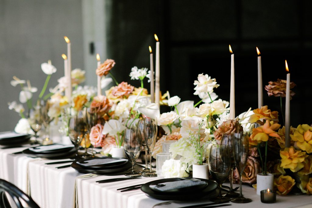 Romantic and modern DC wedding tablescape with creative florals by Sweet Root Village at the chic DC wedding venue La Vie Restaurant. Styled by East Made and photographed by DC film wedding photographer Lindley Battle.