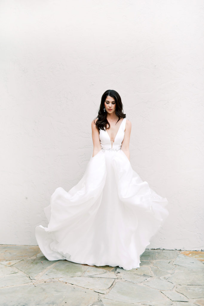 Stylish wedding dress photographed at Hotel Domestique in South Carolina.