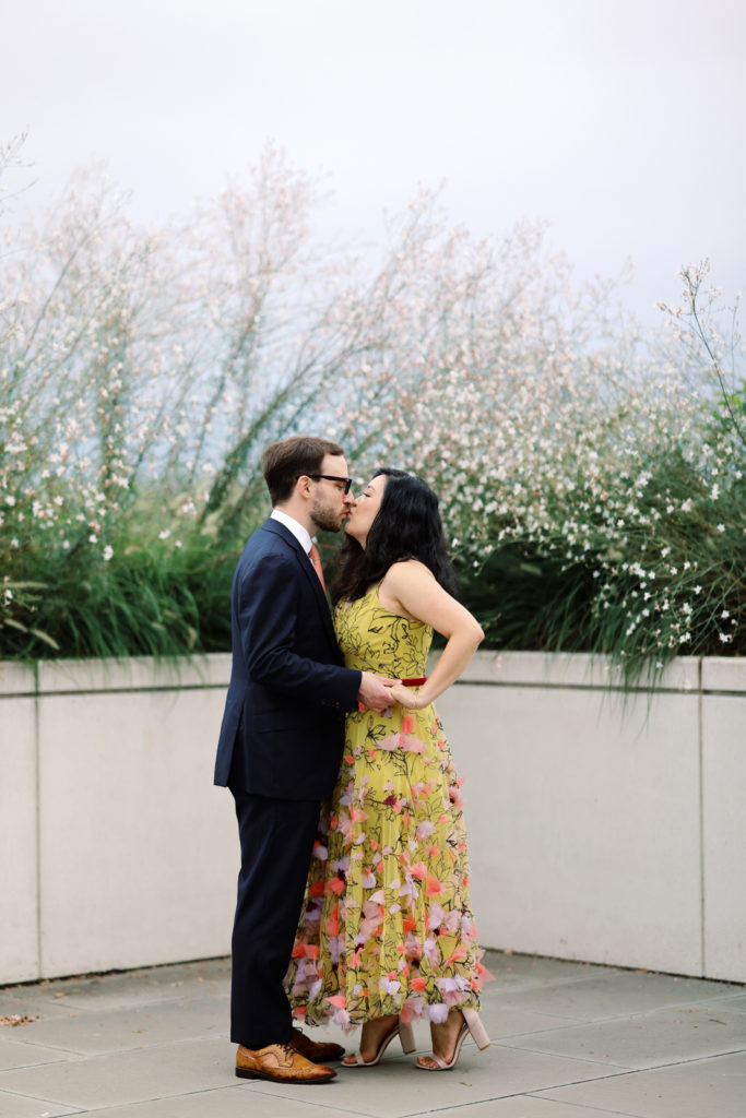 DC film wedding photographer photographs a stylish couple during their Kennedy Center engagement session.