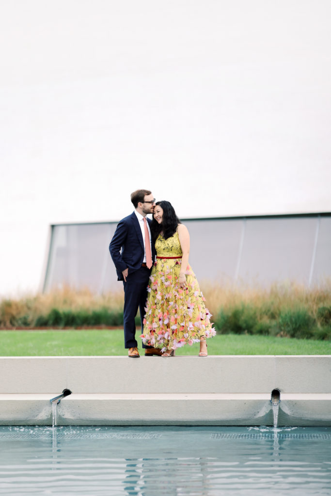 DC wedding photographer photographs a stylish couple during a modern engagement session at the Kennedy Center.