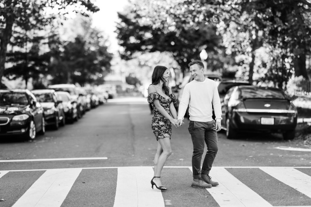 A DC wedding photographer photographs a couple during their modern engagement session in Georgetown.